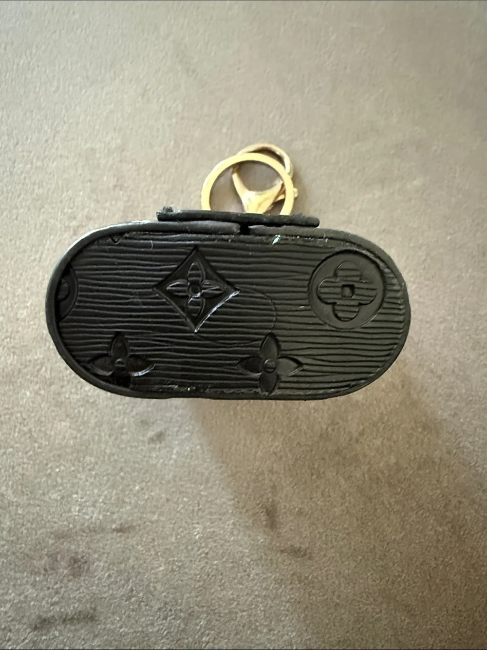 Louis Vuitton Black Embossed Monogram Key Chain & AirPod Holder Gold